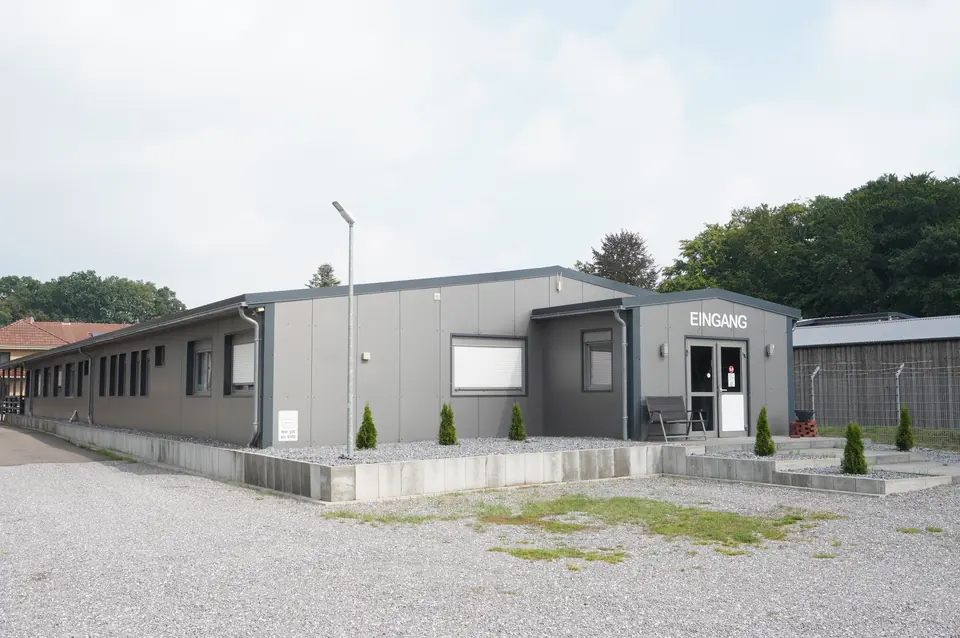 The motel from outside with parking